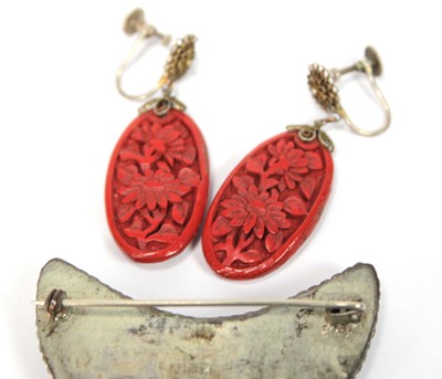 Lot 501 - A cinnabar lacquer brooch of crescent moon...