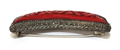 Lot 501 - A cinnabar lacquer brooch of crescent moon...