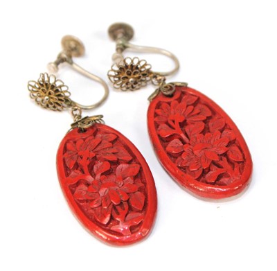 Lot 501 - A cinnabar lacquer brooch of crescent moon...