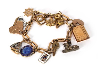 Lot 507 - A 9ct yellow gold rectangular and round link...