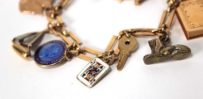 Lot 507 - A 9ct yellow gold rectangular and round link...