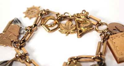 Lot 507 - A 9ct yellow gold rectangular and round link...