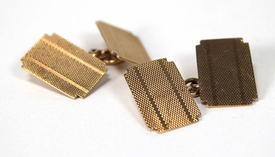 Lot 508 - A pair of 9ct yellow gold engine turned...