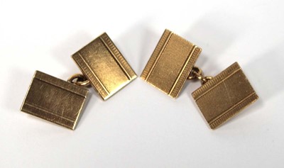 Lot 509 - A pair of 9ct yellow gold engine turned...