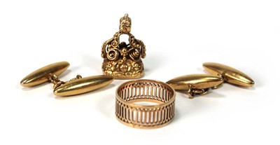 Lot 511 - A pair of yellow metal cufflinks of torpedo...