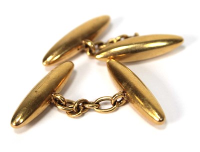 Lot 511 - A pair of yellow metal cufflinks of torpedo...