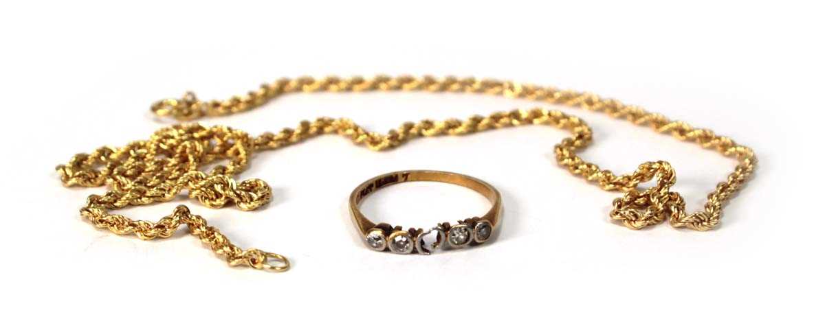 Lot 517 - An 18ct yellow gold ring set small diamonds...