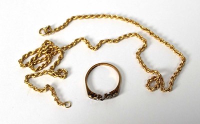 Lot 517 - An 18ct yellow gold ring set small diamonds...