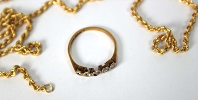 Lot 517 - An 18ct yellow gold ring set small diamonds...