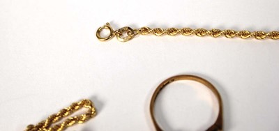Lot 517 - An 18ct yellow gold ring set small diamonds...