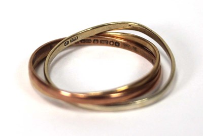 Lot 519 - A 9ct tri-colour triple puzzle type band ring,...