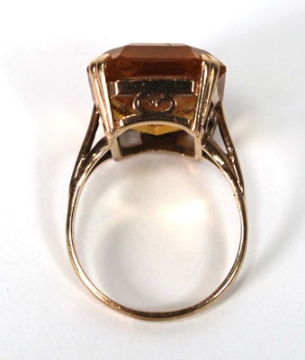 Lot 521 - A 9ct yellow gold dress ring set rectangular...