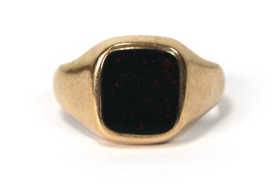 Lot 522 - A 9ct yellow gold signet ring set bloodstone,...