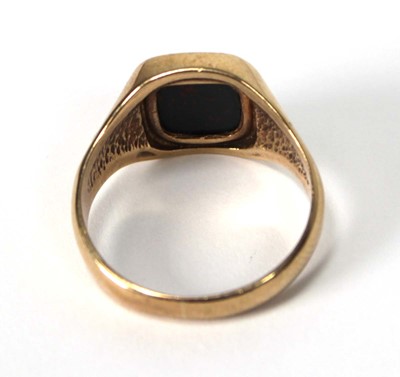 Lot 522 - A 9ct yellow gold signet ring set bloodstone,...