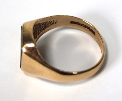 Lot 522 - A 9ct yellow gold signet ring set bloodstone,...