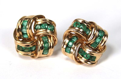 Lot 523 - A pair of 9ct yellow gold ear studs of knot...