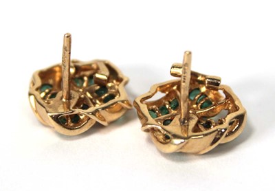 Lot 523 - A pair of 9ct yellow gold ear studs of knot...