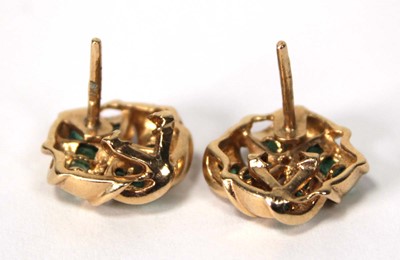 Lot 523 - A pair of 9ct yellow gold ear studs of knot...