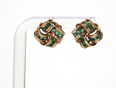 Lot 523 - A pair of 9ct yellow gold ear studs of knot...