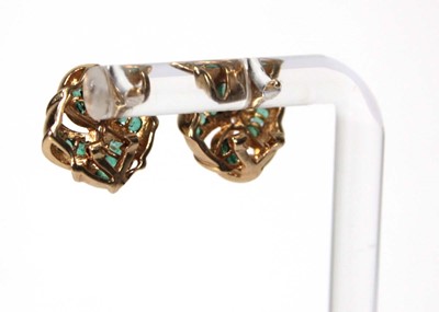 Lot 523 - A pair of 9ct yellow gold ear studs of knot...