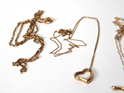 Lot 527 - Four 9ct yellow gold finelink necklaces, one...