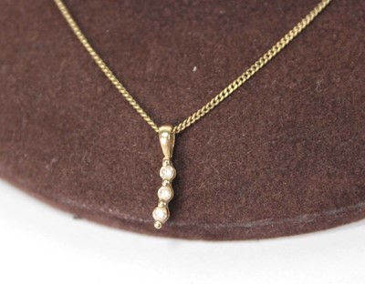 Lot 529 - A 9ct yellow gold flat curblink necklace...