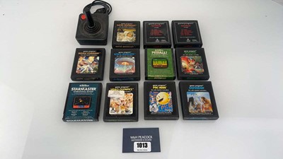 Lot 1013 - 11x Atari 2600 games together with a Joystick