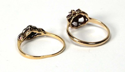 Lot 532 - A 9ct yellow gold dress ring set rubies and...