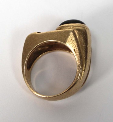 Lot 536 - A 14ct yellow gold ring of abstract design set...