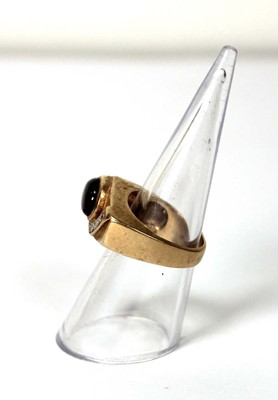 Lot 536 - A 14ct yellow gold ring of abstract design set...