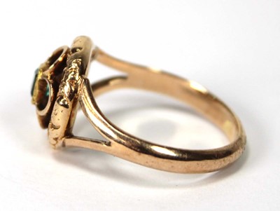 Lot 539 - A 9ct yellow gold ring set green stone in a...