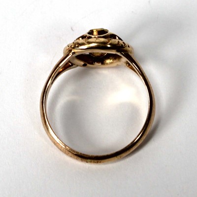 Lot 539 - A 9ct yellow gold ring set green stone in a...