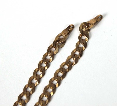 Lot 560 - A 9ct yellow gold flat curblink necklace...