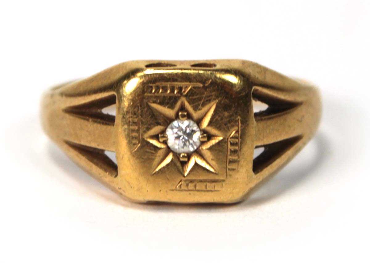 Lot 562 - An 19ct yellow gold signet ring set brilliant...