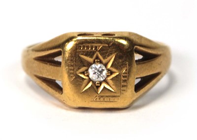 Lot 562 - An 19ct yellow gold signet ring set brilliant...