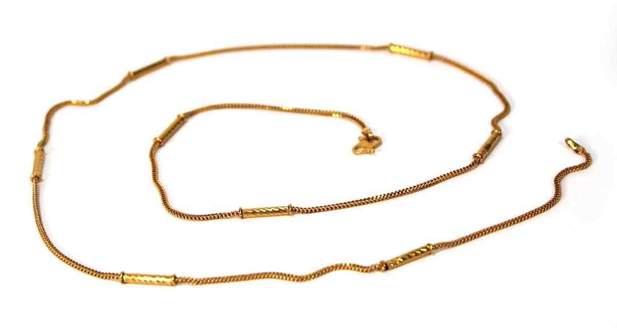 Lot 567 - A Middle Eastern yellow metal multi link...
