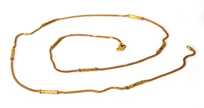 Lot 567 - A Middle Eastern yellow metal multi link...
