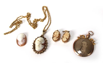 Lot 571 - A yellow metal ropetwist necklace suspending a...