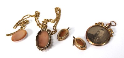Lot 571 - A yellow metal ropetwist necklace suspending a...