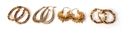 Lot 572 - Four pairs of 9ct yellow gold hoop earrings...