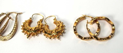 Lot 572 - Four pairs of 9ct yellow gold hoop earrings...