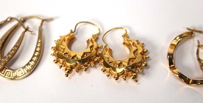 Lot 572 - Four pairs of 9ct yellow gold hoop earrings...