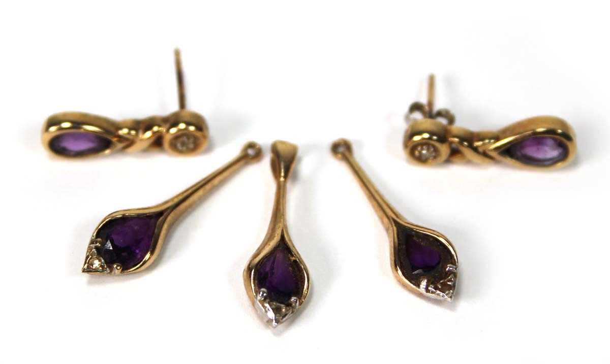 Lot 575 - Two pairs of 9ct yellow gold earrings set...