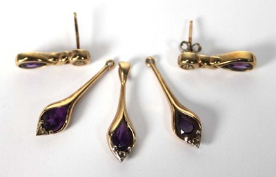 Lot 575 - Two pairs of 9ct yellow gold earrings set...