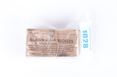 Lot 1028 - An original string-tied paper packet of ten...