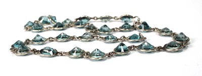 Lot 576 - A silver necklace suspending twenty-nine round...
