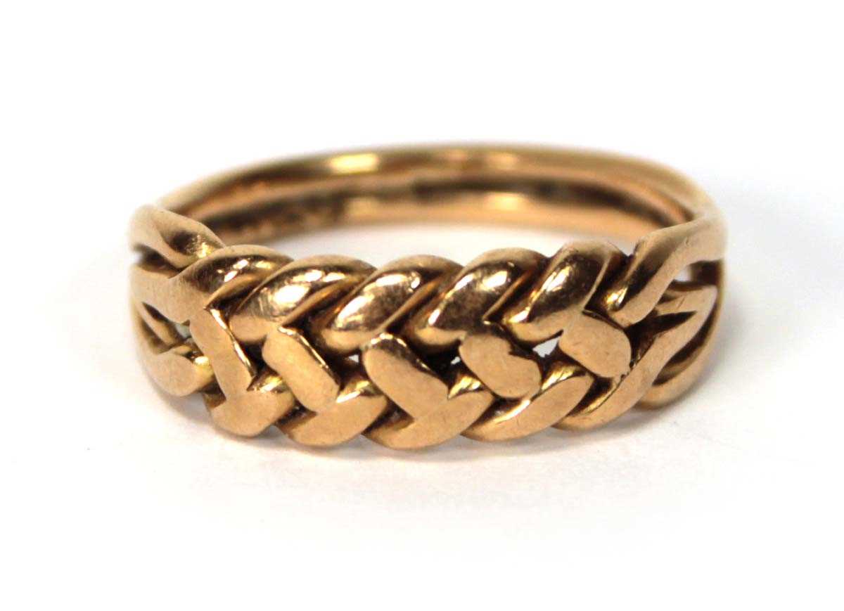 Lot 577 - An 18ct yellow gold keepers type ring, ring...