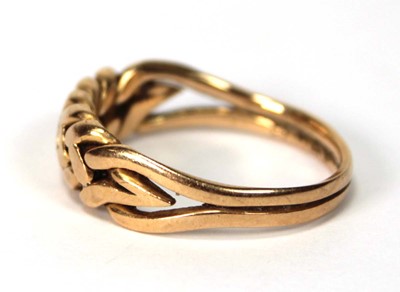 Lot 577 - An 18ct yellow gold keepers type ring, ring...