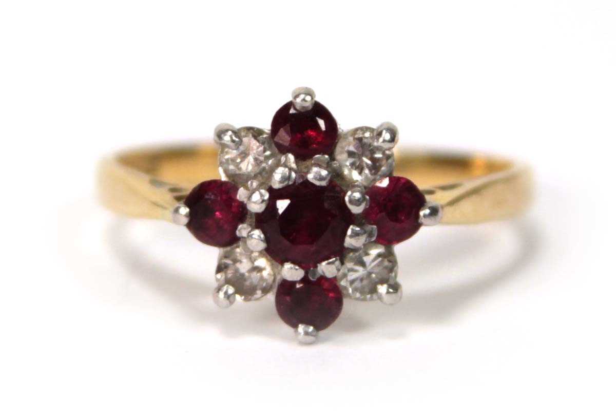 Lot 579 - An 18ct yellow gold and platinum highlighted...