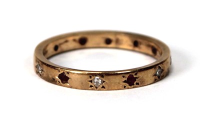 Lot 580 - A yellow metal band ring set six small...
